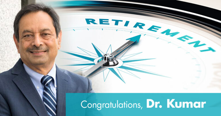 The face of a sundial reads "RETIREMENT" At bottom reads "Congratulations, Dr. Kumar"
