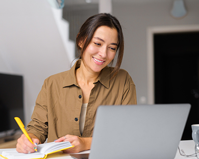 Smiling woman working on a computer